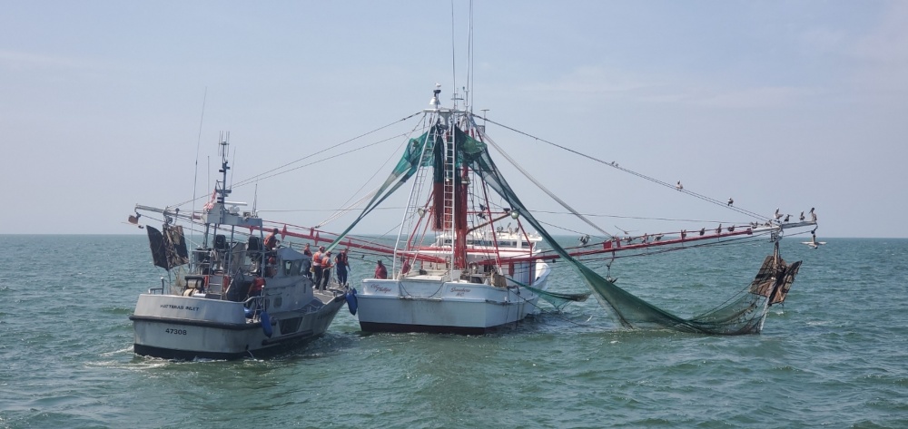 Coast Guard Boat Crew Rescues Man on Fishing Boat in North Carolina