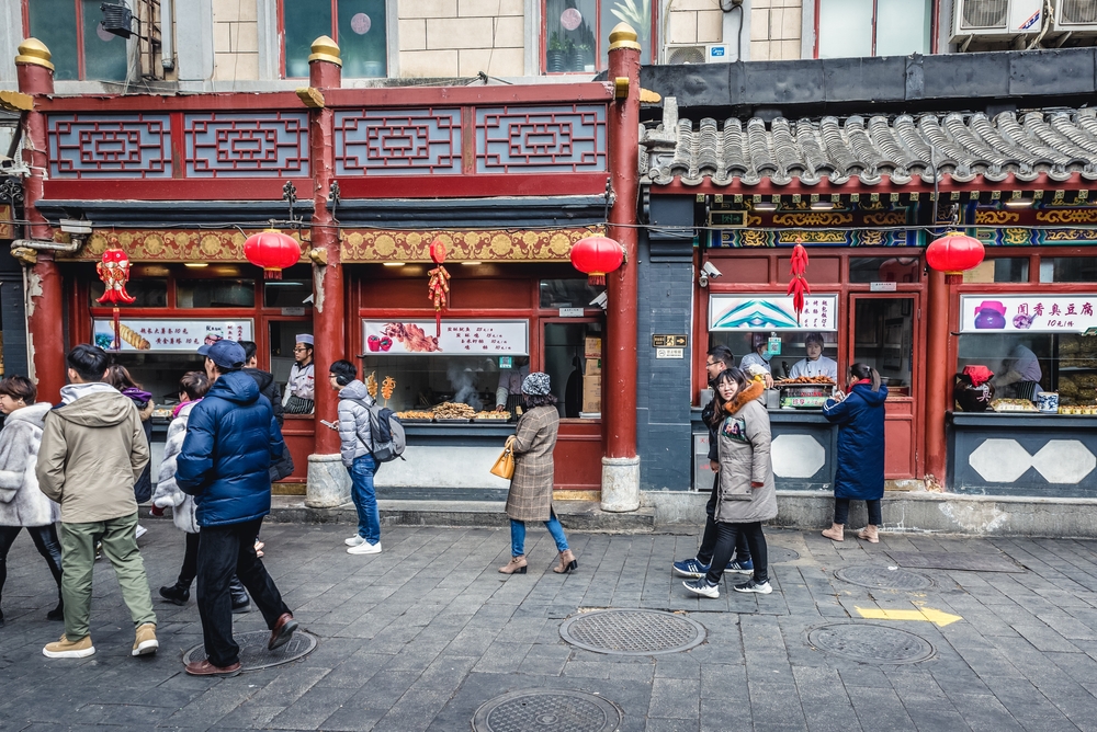 Chinas Deflationary Strains Persist Even as Consumer Inflation Hits 21-Month High